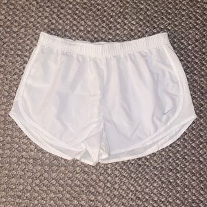 White Nike shorts